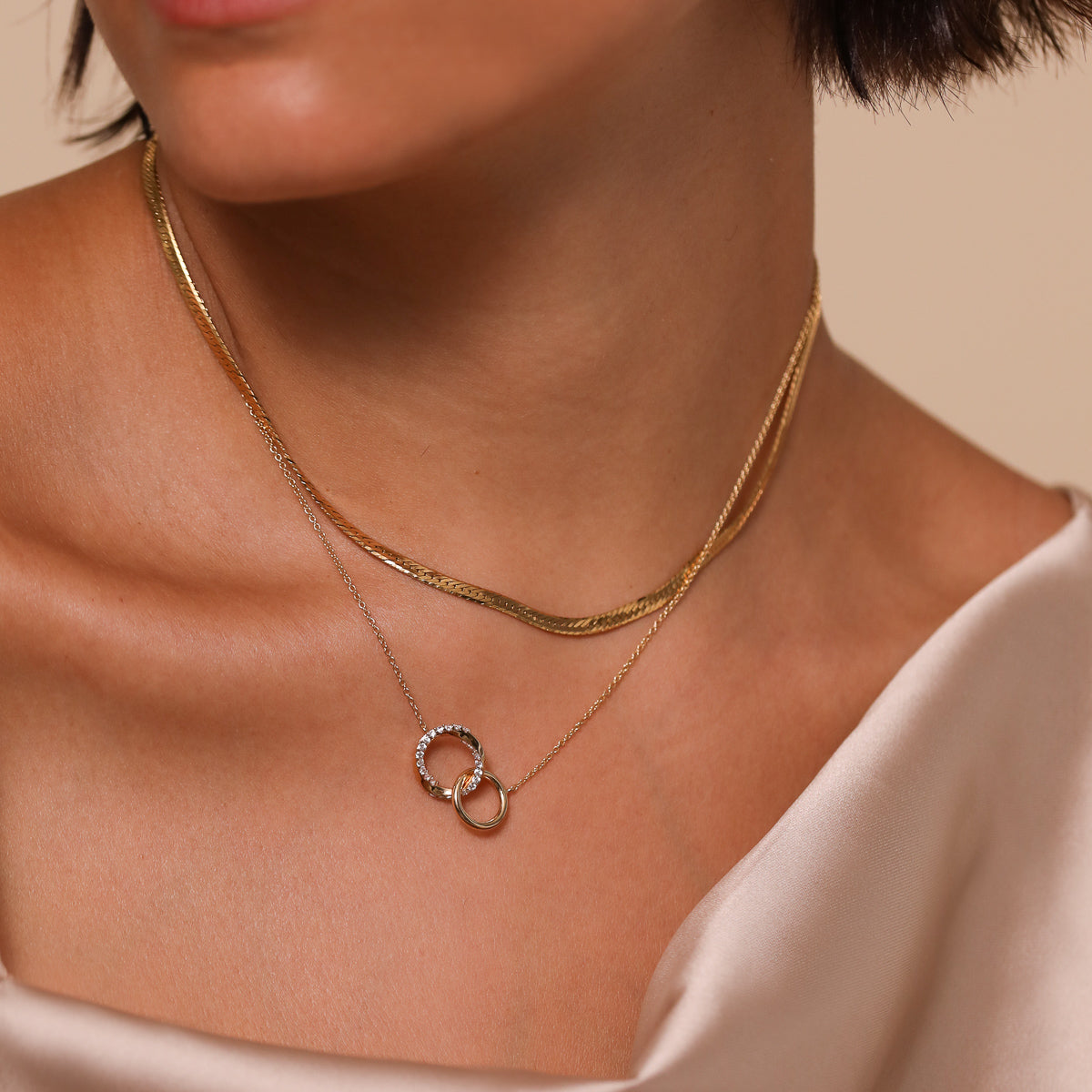 Orbit Crystal Chain Necklace in Gold worn with Snake Chain Necklace in Gold