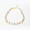Opulent Pearl Necklace in Gold flat lay