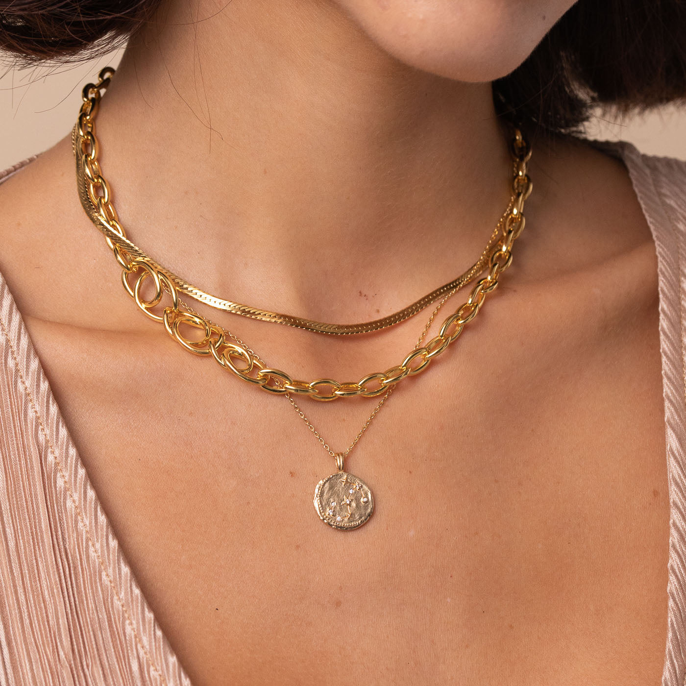 Orbit Chain Necklace in Gold worn layered with necklaces