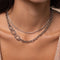Orbit Chain Necklace in Silver worn with tennis necklace in silver