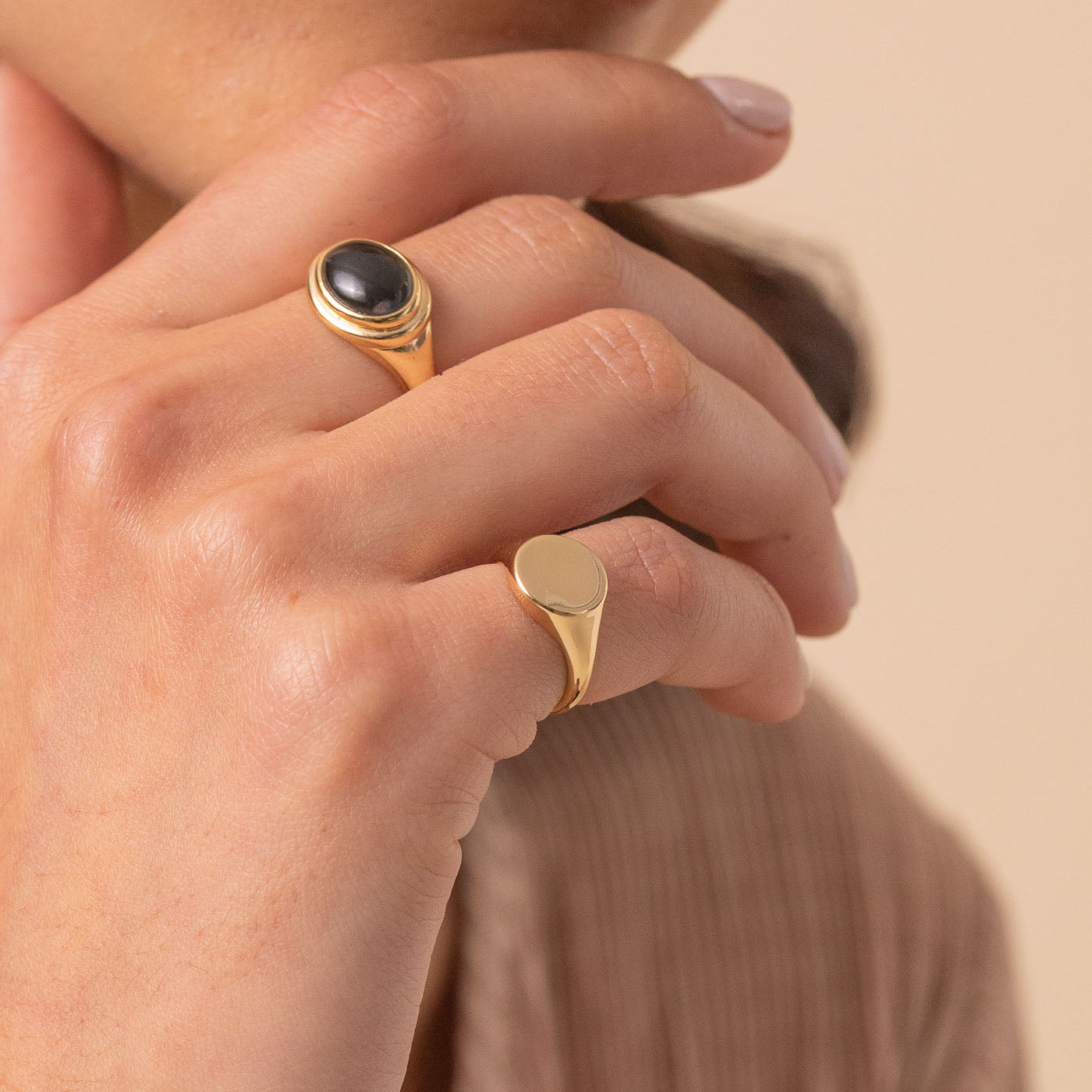 Orbit Signet Ring in Gold worn with Mood ring in gold