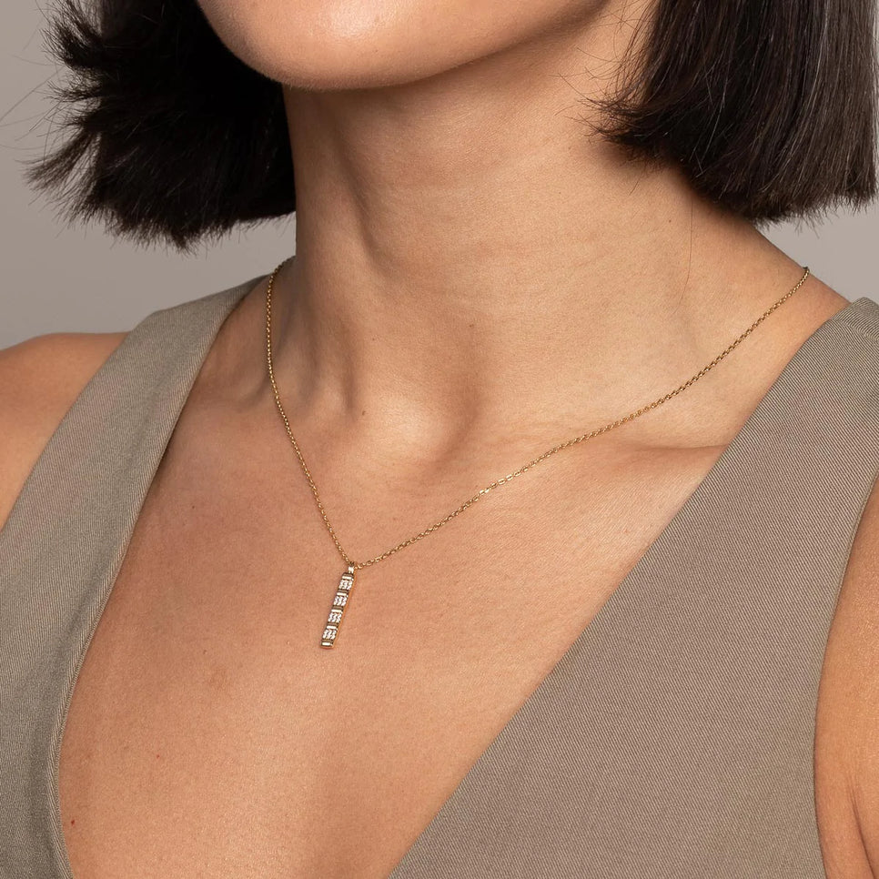 Pleated Crystal Pendant Necklace in Gold worn