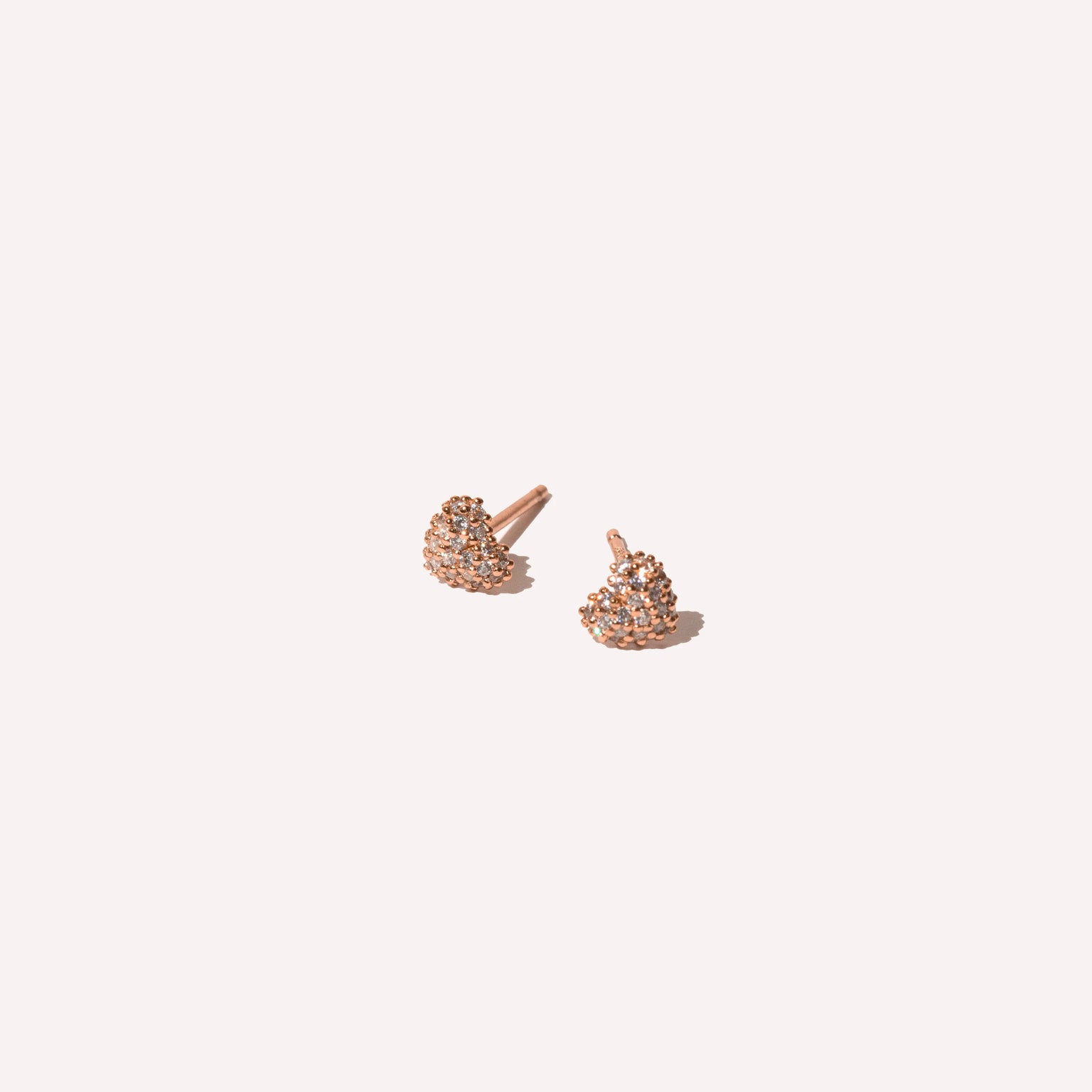 Heart Pave Stud Earrings in Rose Gold flat lay