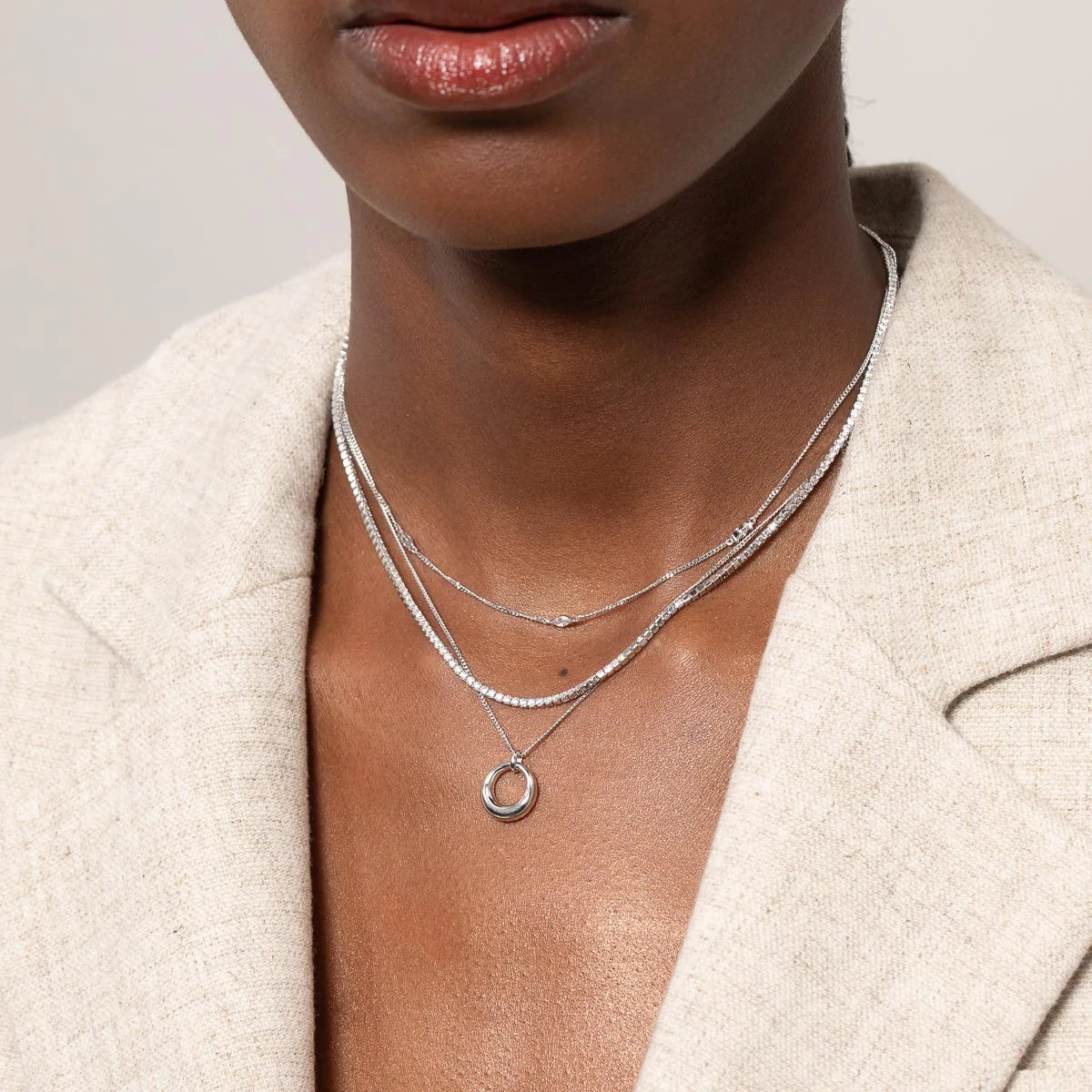 Station Navette Crystal Necklace in Silver worn layered with necklaces