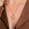 Bold Zodiac Gemini Pendant Necklace in Gold worn