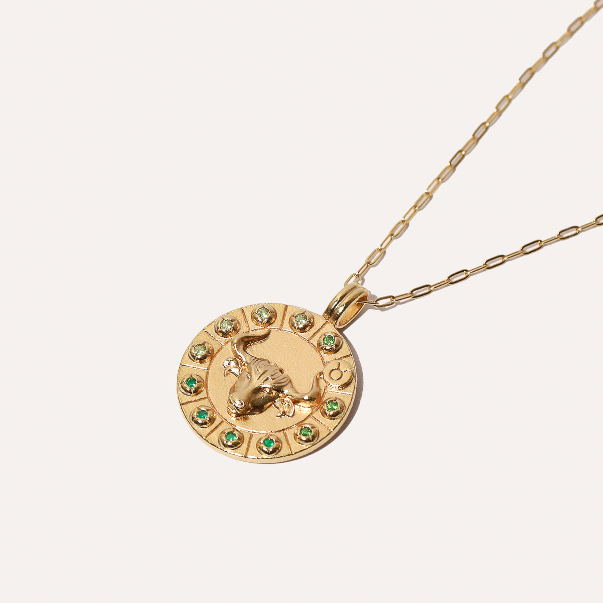Taurus Bold Zodiac Pendant Necklace in Gold flat lay