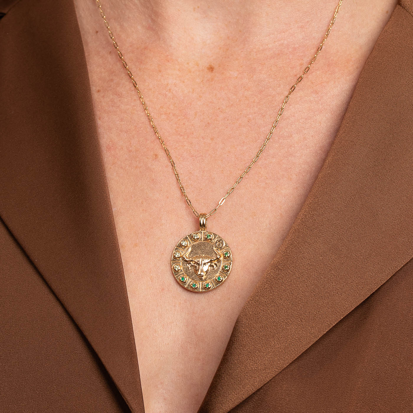Taurus Bold Zodiac Pendant Necklace in Gold worn