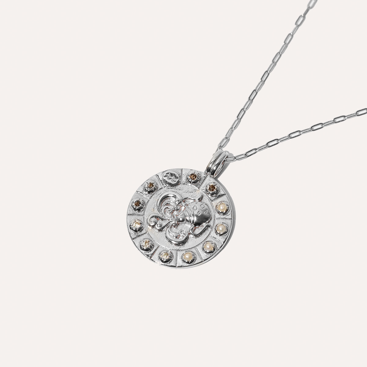 Aquarius Bold Zodiac Pendant Necklace in Silver Flat Lay