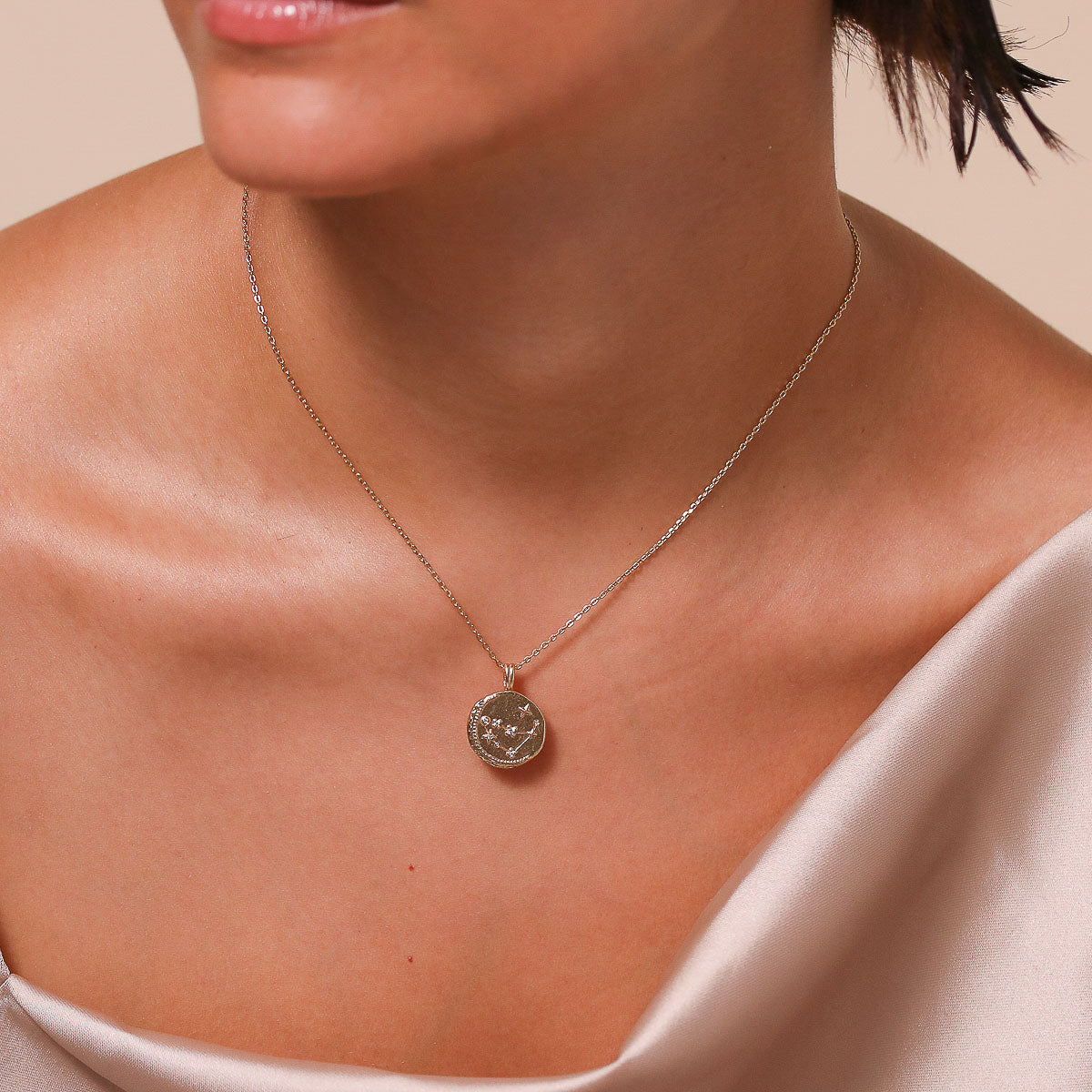 Capricorn Zodiac Pendant Necklace in Gold worn