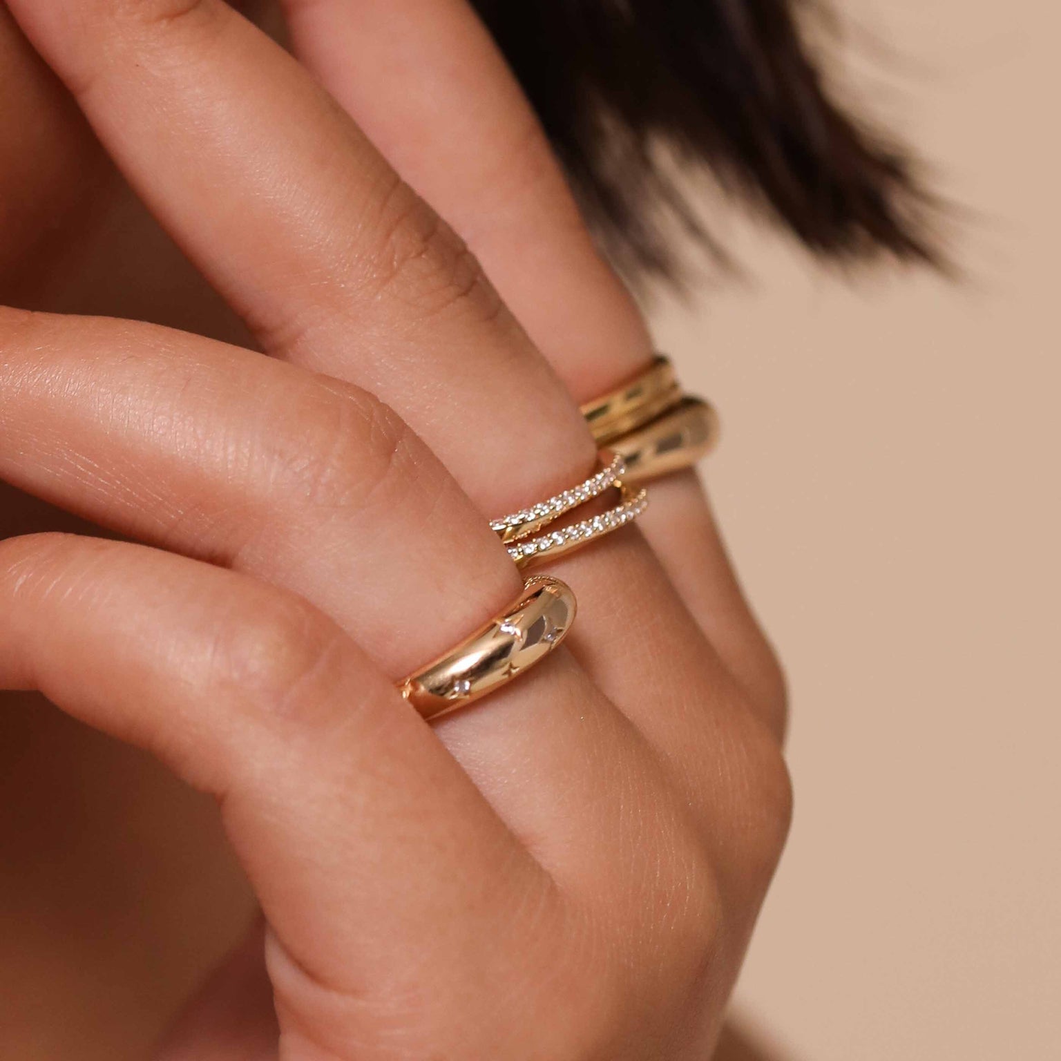 Cosmic Dome Ring in Gold worn layered with rings