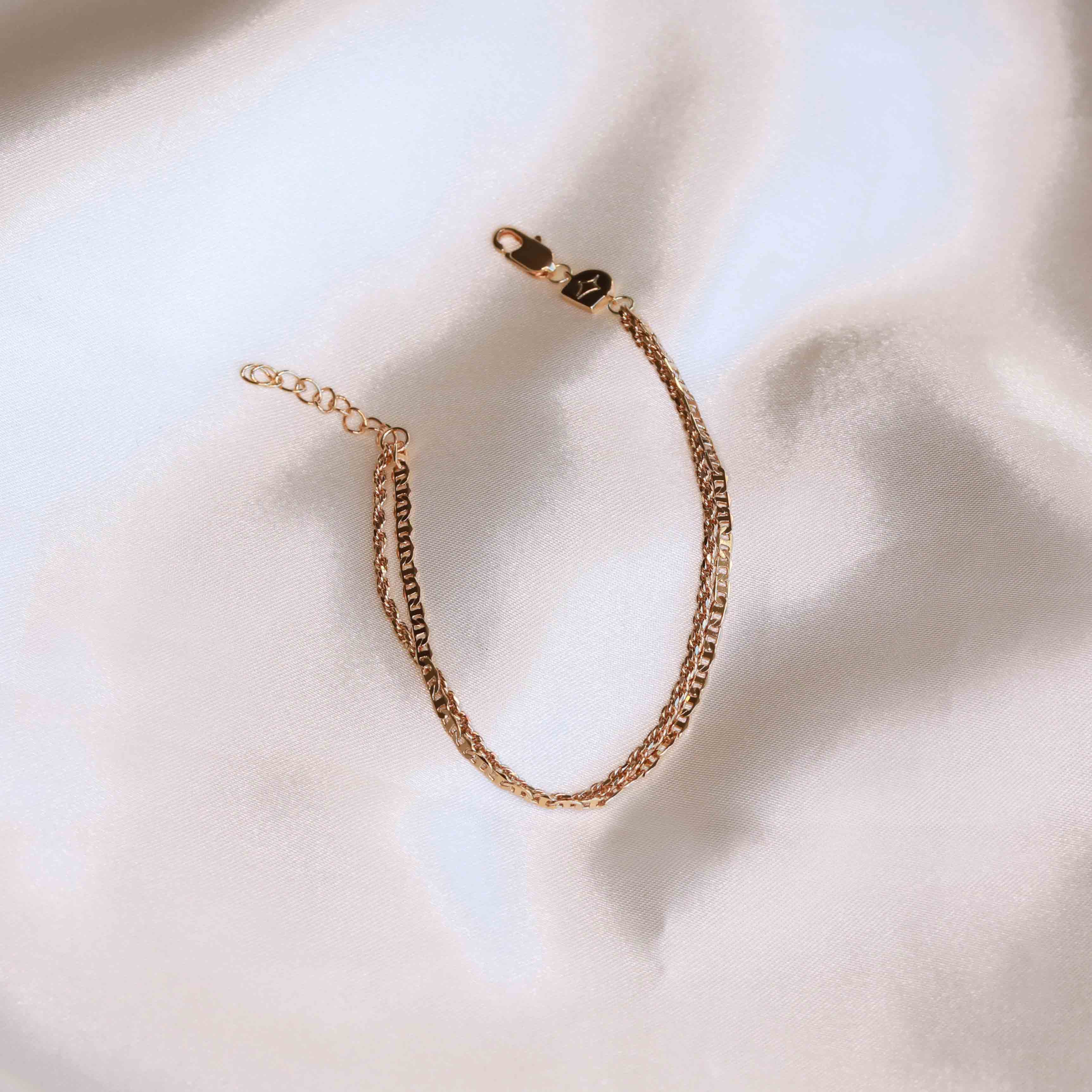 Flat lay shot of Duo Chain Bracelet in Gold
