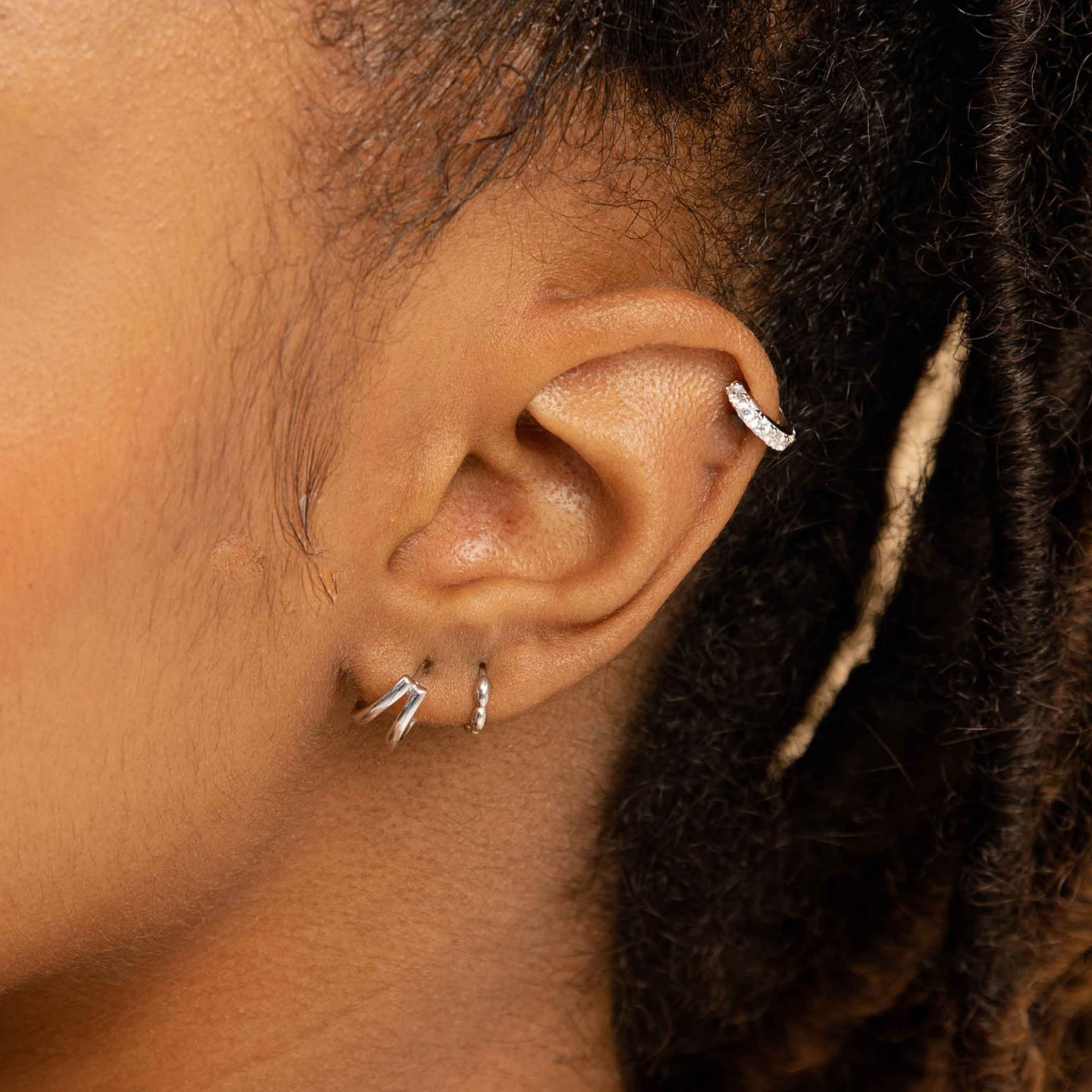 Bubble Clicker in Silver in second lobe piercing