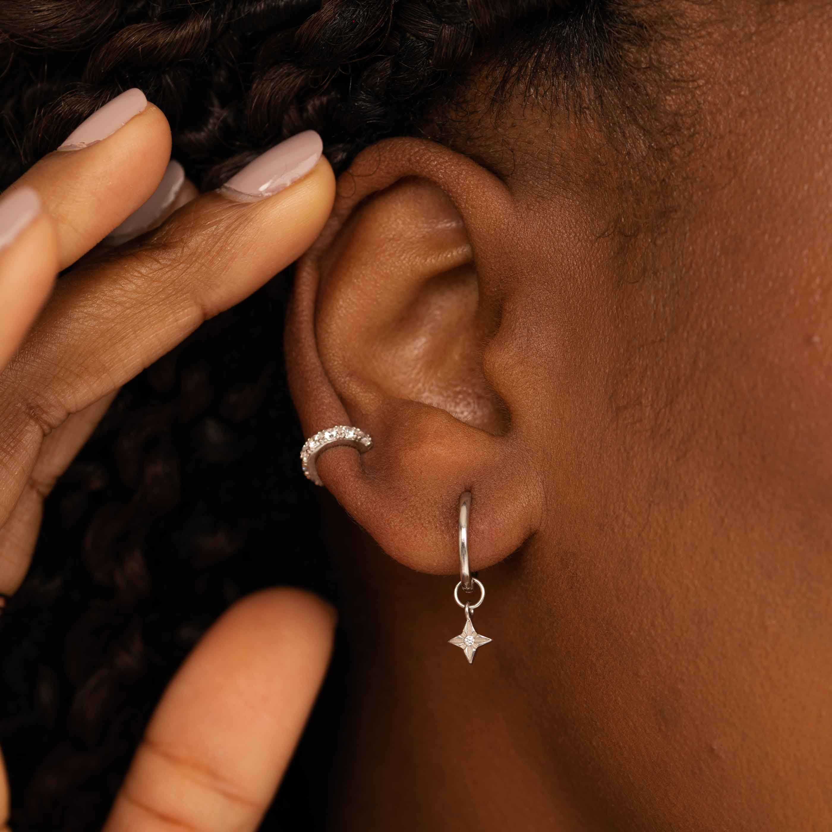 Etched Star Hoops in Silver worn with ear cuff