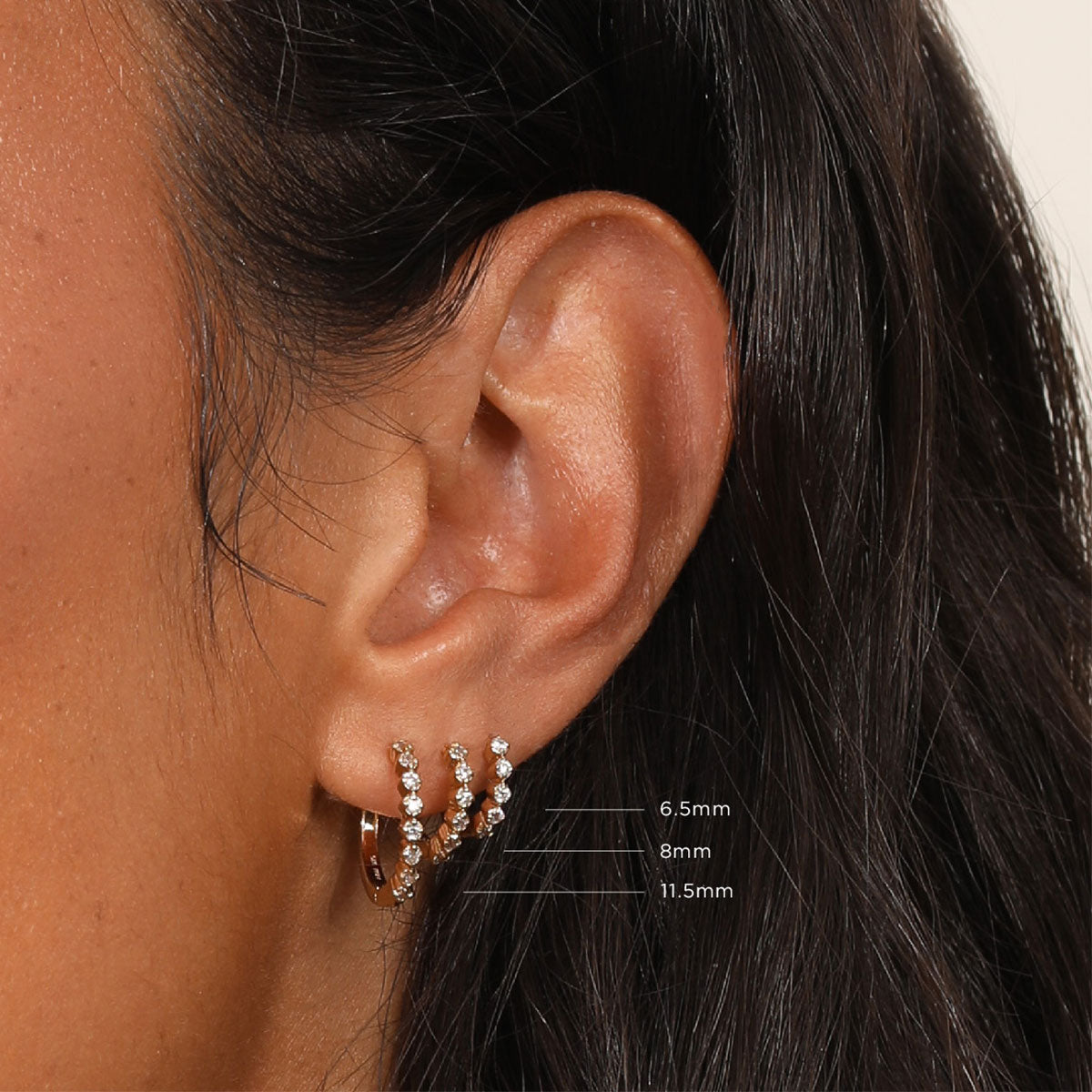Illume Crystal 6.5mm, 8mm, 11.5mm Hoops in Gold worn