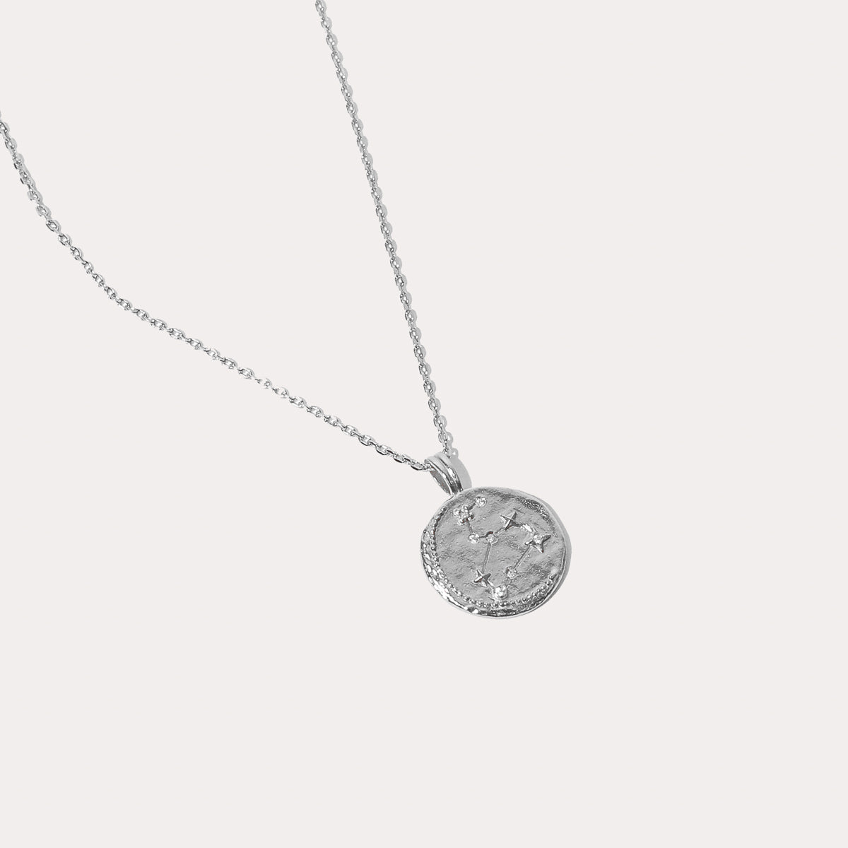 Close up shot of the front of the Leo Zodiac Pendant Necklace in Silver