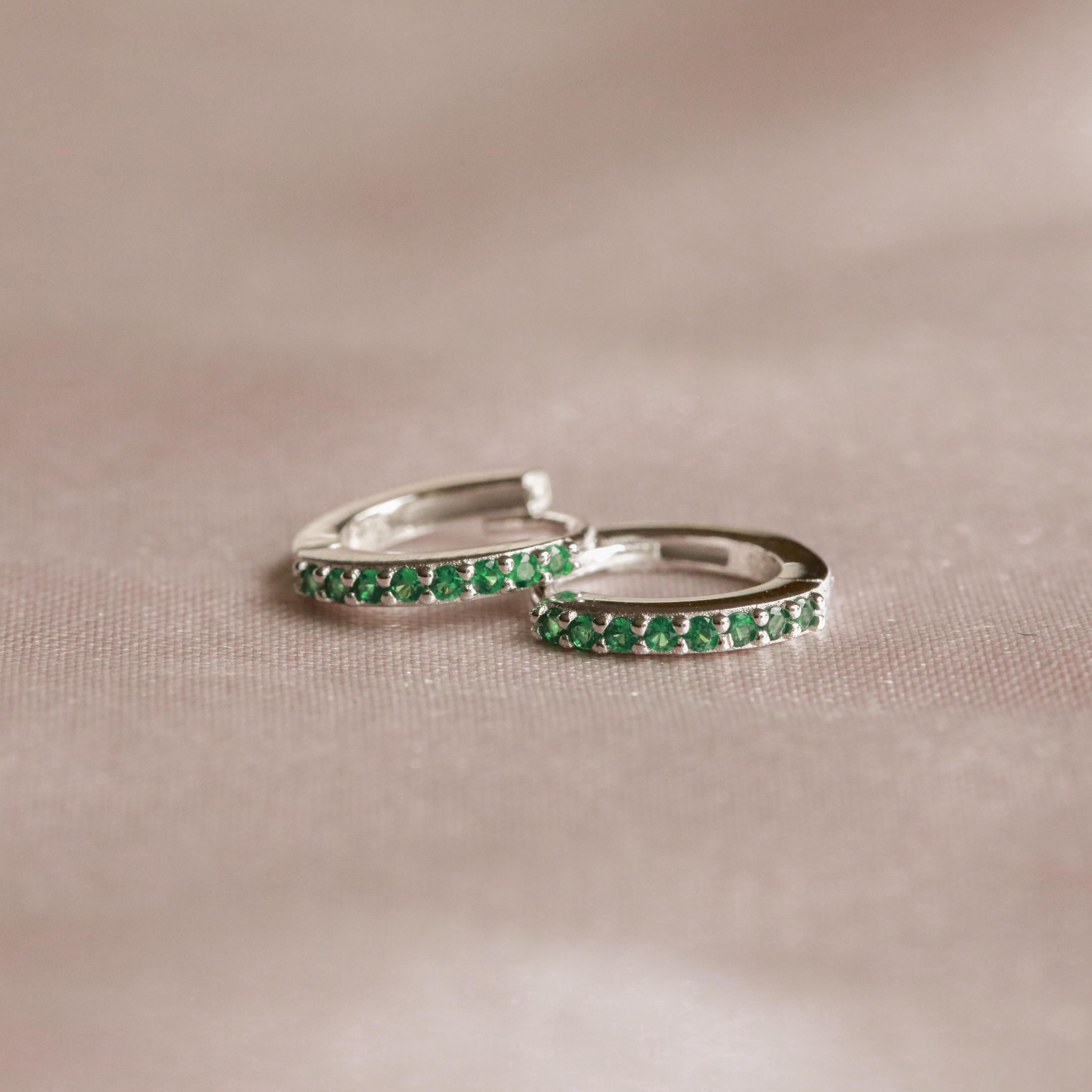 May Birthstone Huggies in Silver with Emerald CZ