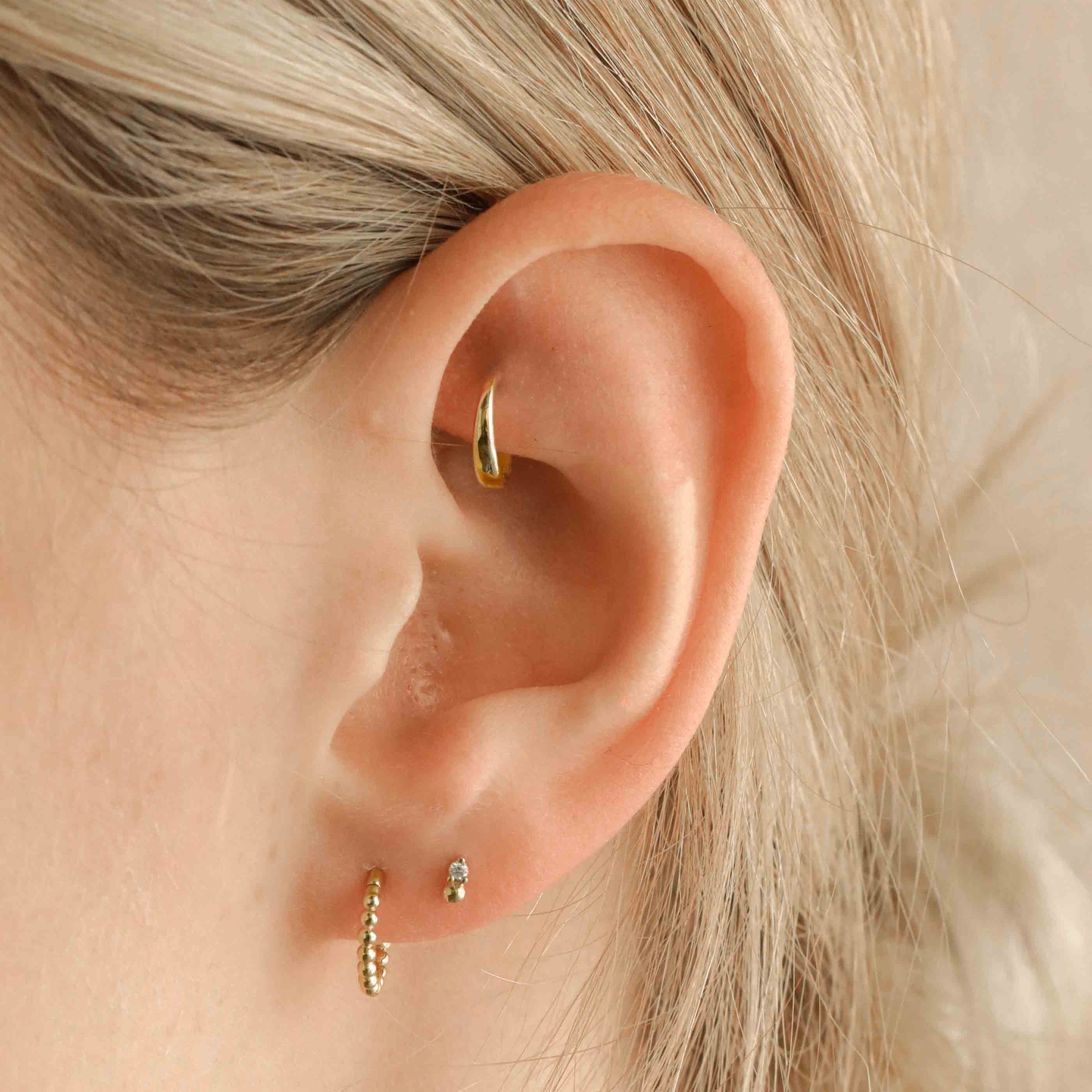 Gold piercing on sale