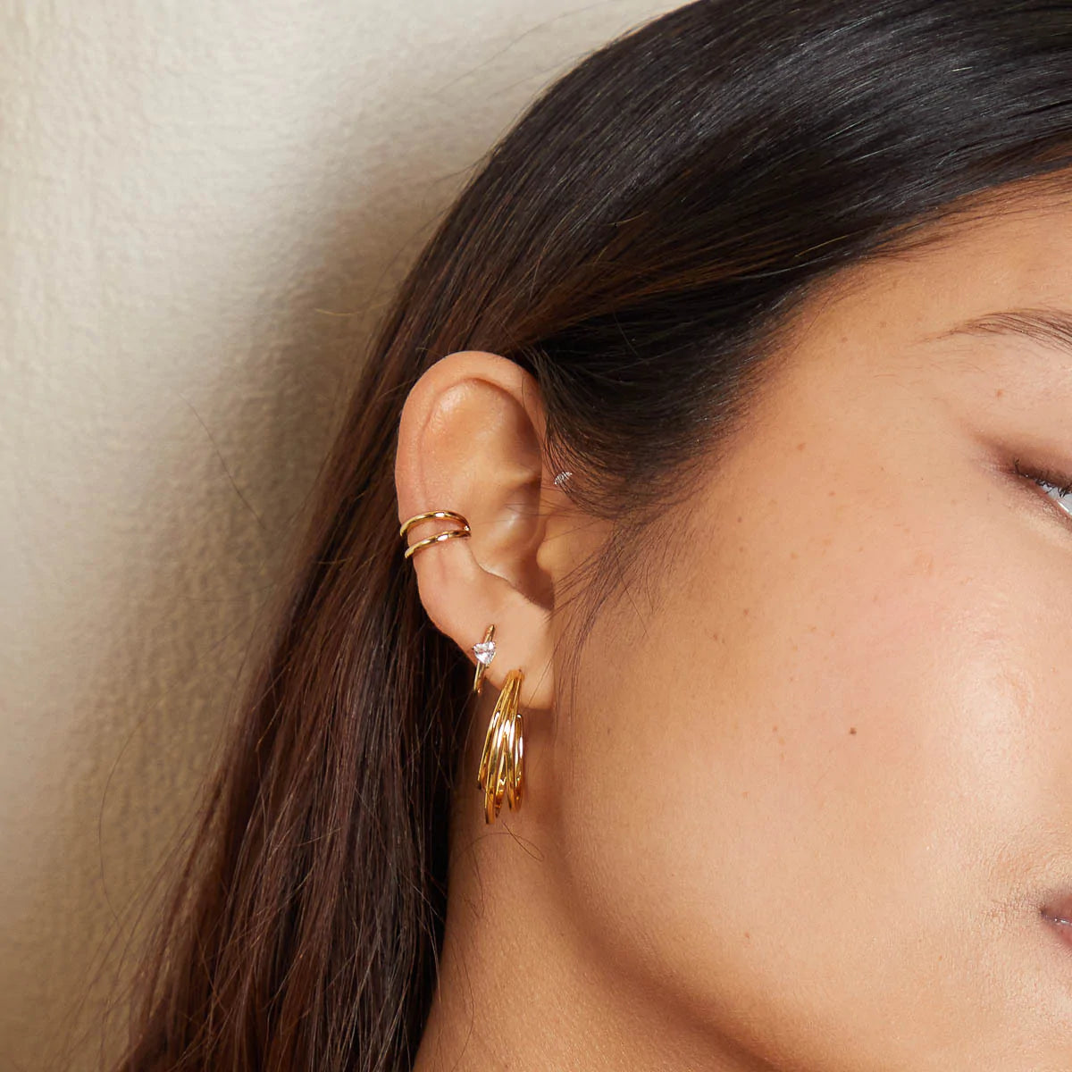 Illusion Essential Ear Cuff in Gold worn with other earrings