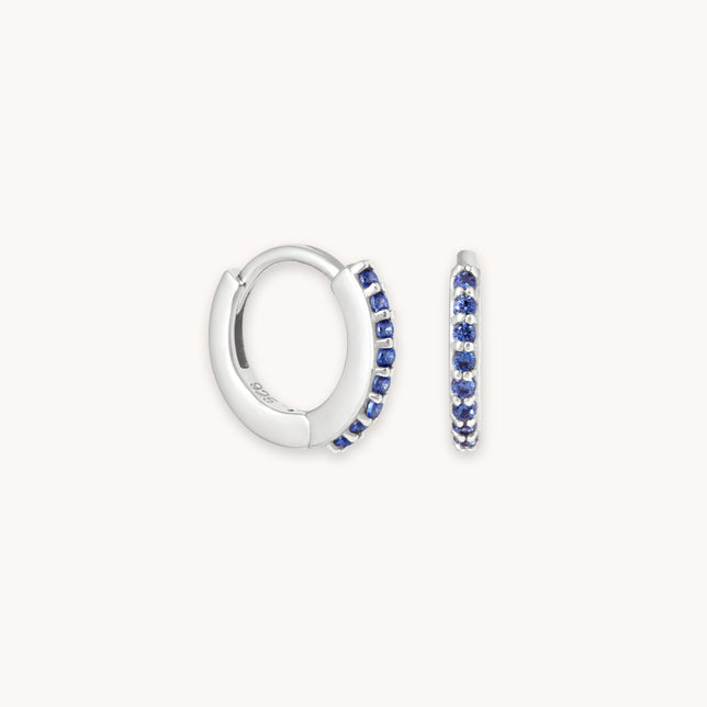 September Birthstone Huggies in Silver with Sapphire CZ