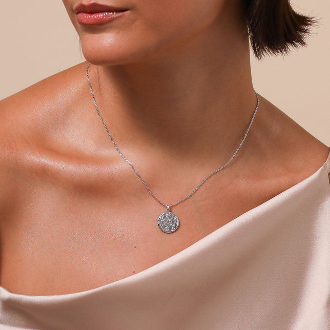 Taurus Zodiac Pendant Necklace in Silver worn