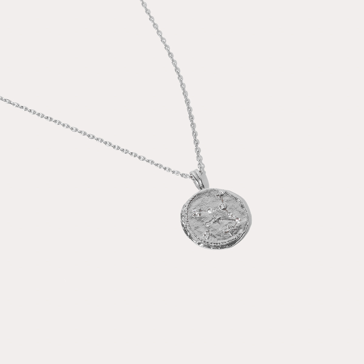 Close up shot of the front of the Virgo Zodiac Pendant Necklace in Silver