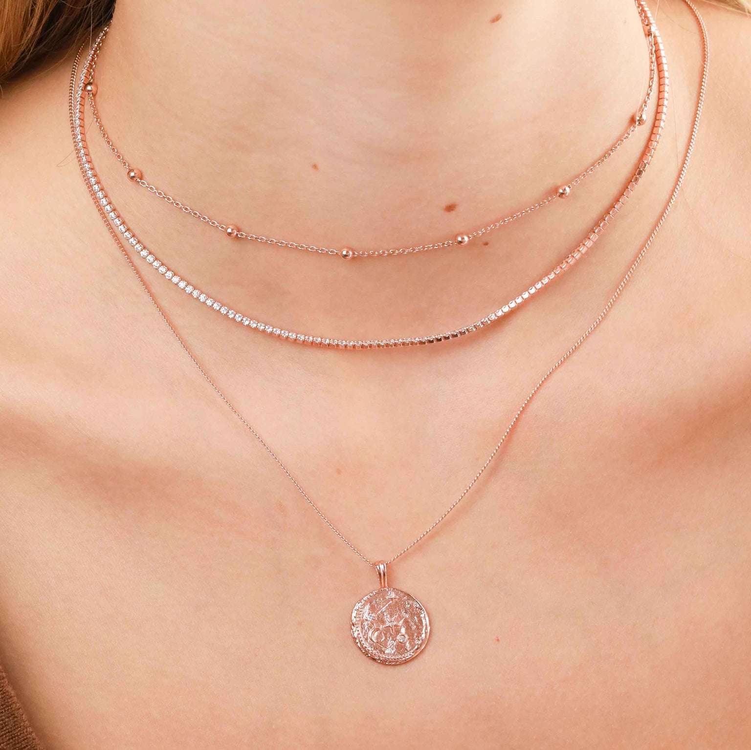 Aquarius Zodiac Pendant Necklace in Rose Gold