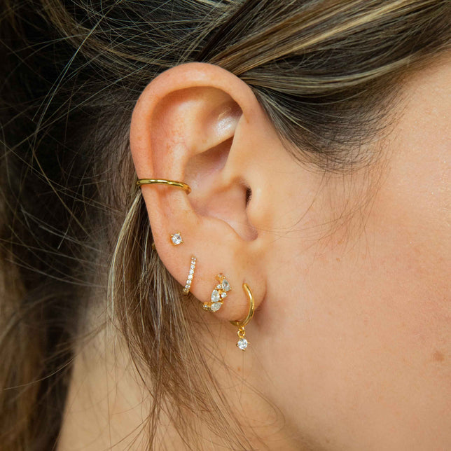 Mystic Simple Stud Earrings in Gold worn in fourth lobe piercing