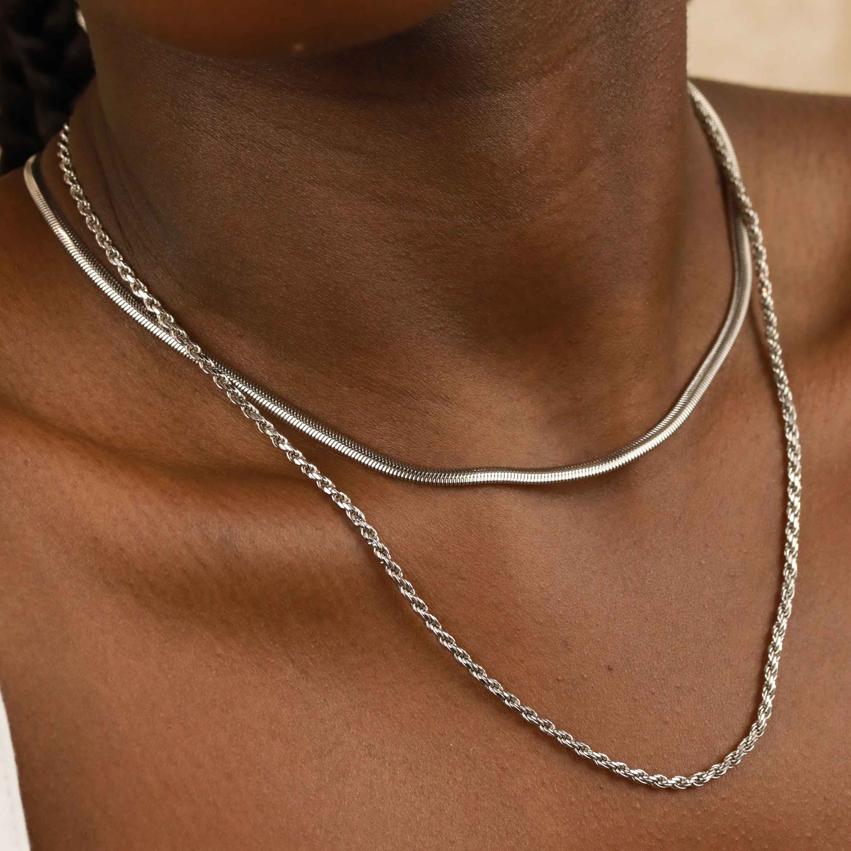 Oval Snake Chain Necklace in Silver worn with bold rope chain