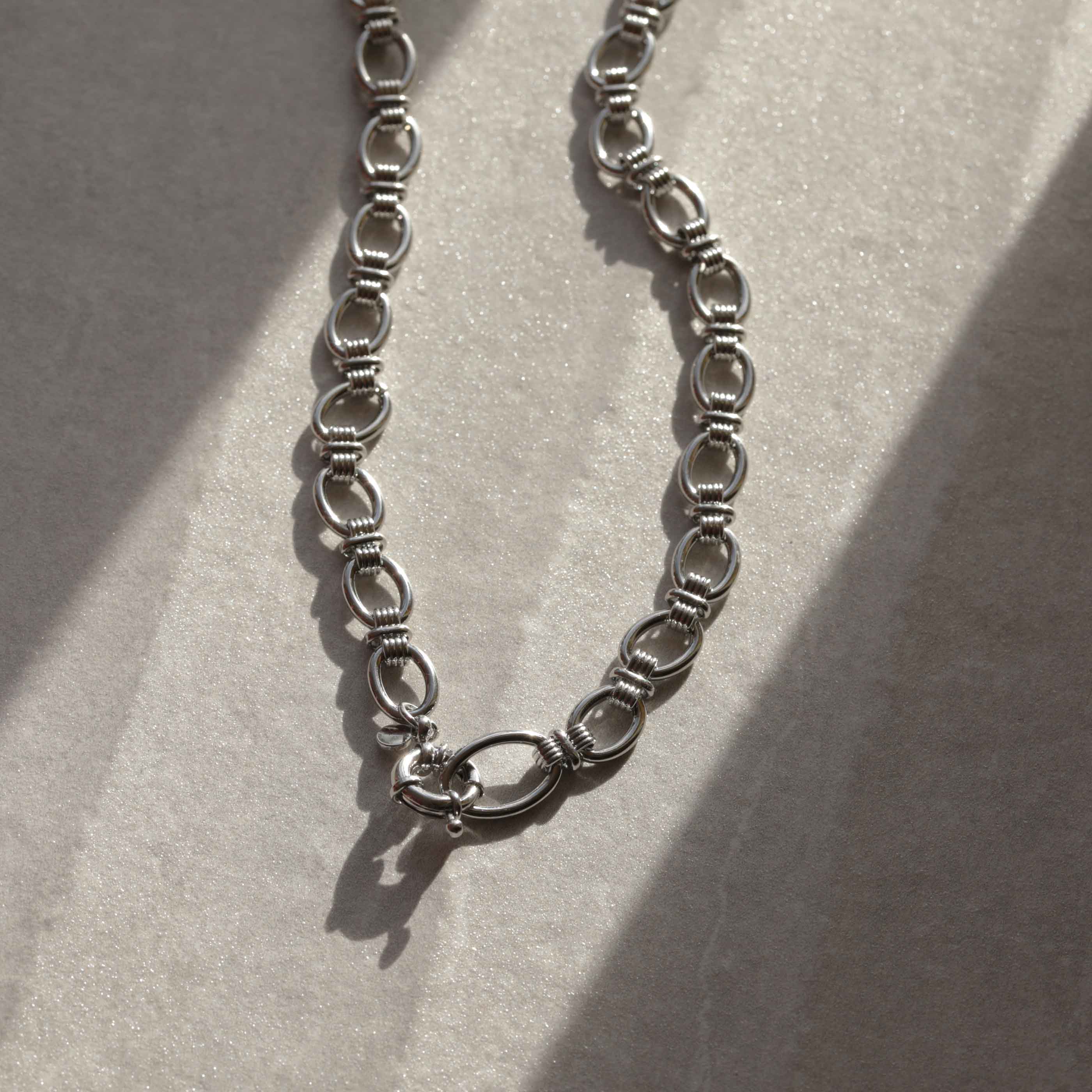 Silver chunky chain necklace with statement clasp and ribbed texture